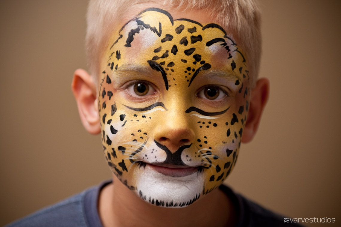 golden leopard face painting